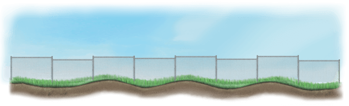 A stepped fence on sloped ground in Houston Texas